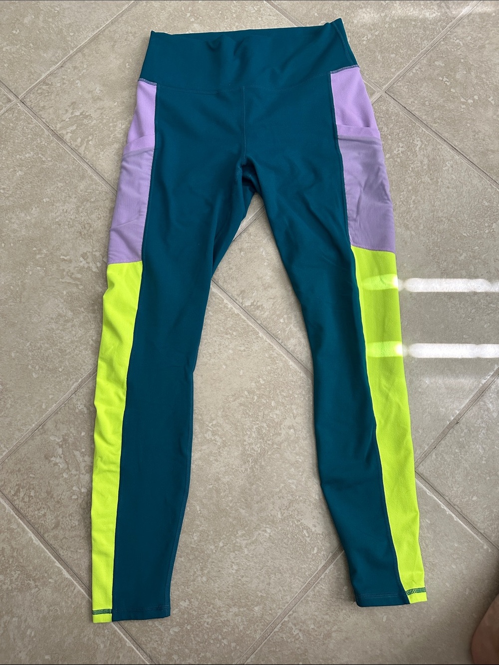 FABLETICS women’s Teal Colorblock Leggings with Purple and Neon Yellow Panels